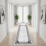 Geometrik ve modern dekoratif yolluk halı tasarımı, açık zemin üzerinde belirgin siyah çizgiler ile sade ve şık bir stil sunar. Minimal desen yapısı ile dengeli ve estetik bir kompozisyon oluşturur.