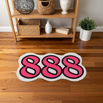 Yan yana dizilmiş “888” rakam kompozisyonu şeklinde, parlak pembe dolgu rengi, net beyaz ara kontur ve güçlü siyah çerçeve ile vurgulanan, sokak sanatı estetiğinde, modern tipografi temalı özel şekilli dekoratif halı tasarımı.
