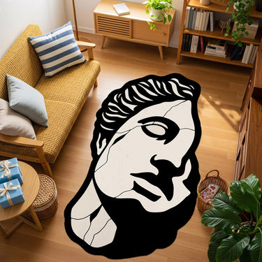 Antik heykel yüzü illüstrasyonu, siyah beyaz kontrastlı portre figürü, klasik sanat teması, minimal grafik stil ve modern pop art estetiğiyle tasarlanmış bu halı, heykel sanatı, yüz silüeti ve sanatsal dekorasyon arayanlar için güçlü bir odak parçasıdır.
