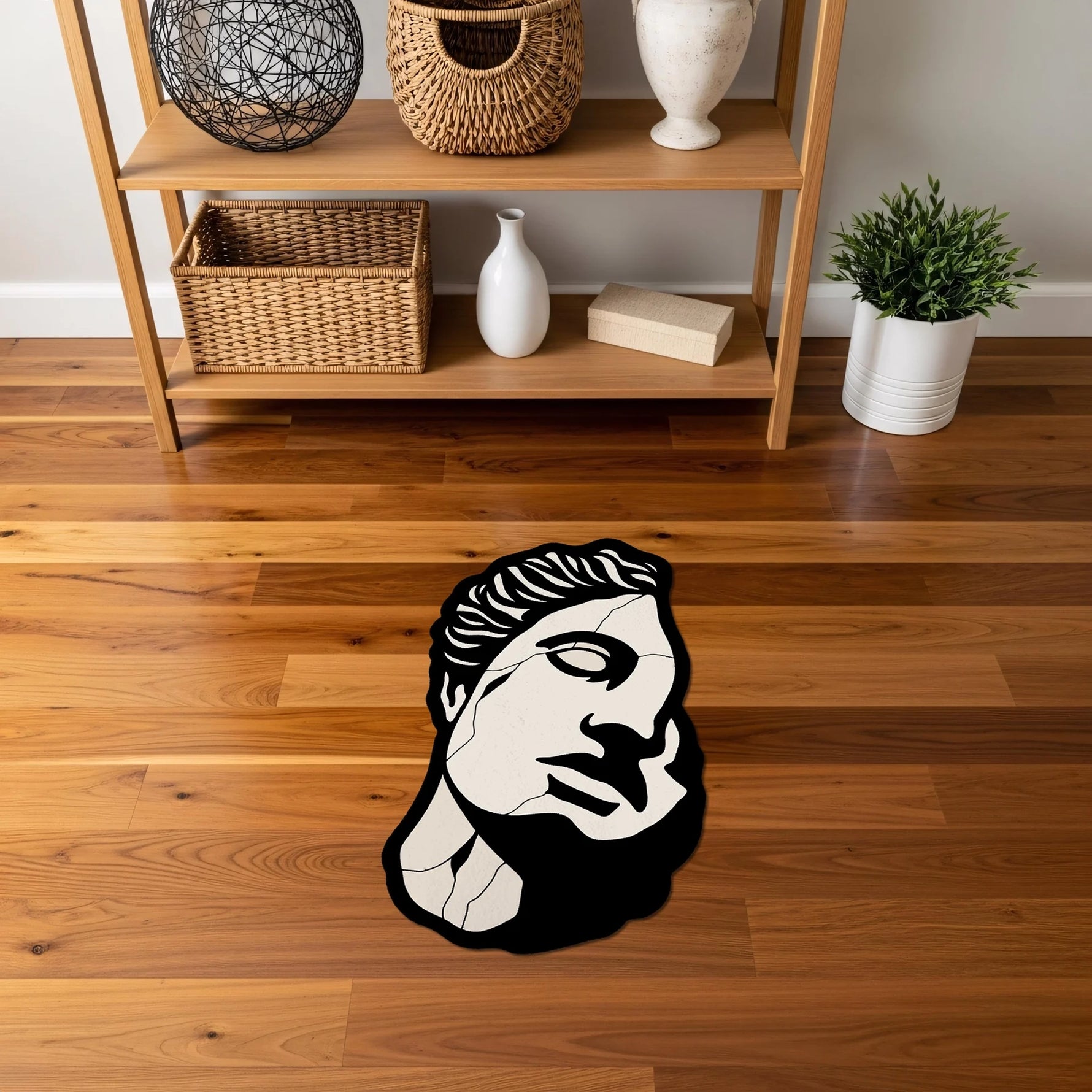 Antik Yunan heykel portresinden ilham alan soyut yüz figürü, minimal siyah kontur çizgileri ve monokrom renk paletiyle tasarlanmış bu halı, klasik sanat, modern grafik tasarım ve figüratif dekorasyon arayanlar için ikonik bir tasarım sunar.

