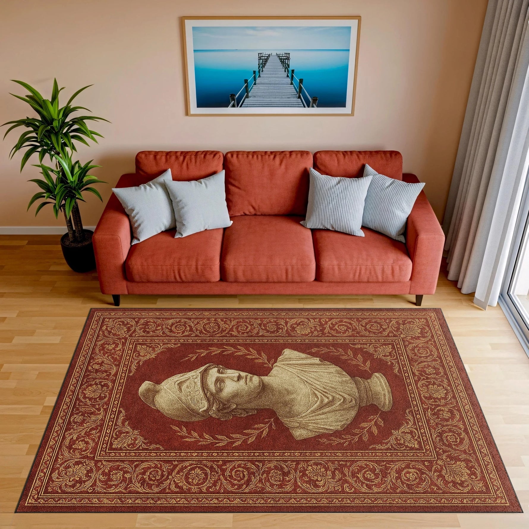 Kırmızı-bordo zemin üzerine konumlandırılmış klasik heykel büstü figürüyle tasarlanmış sanatsal halı; antik sanat ilhamlı portre, yumuşak gölgelendirme, detaylı floral motifler ve zamansız oriental desen anlayışı.