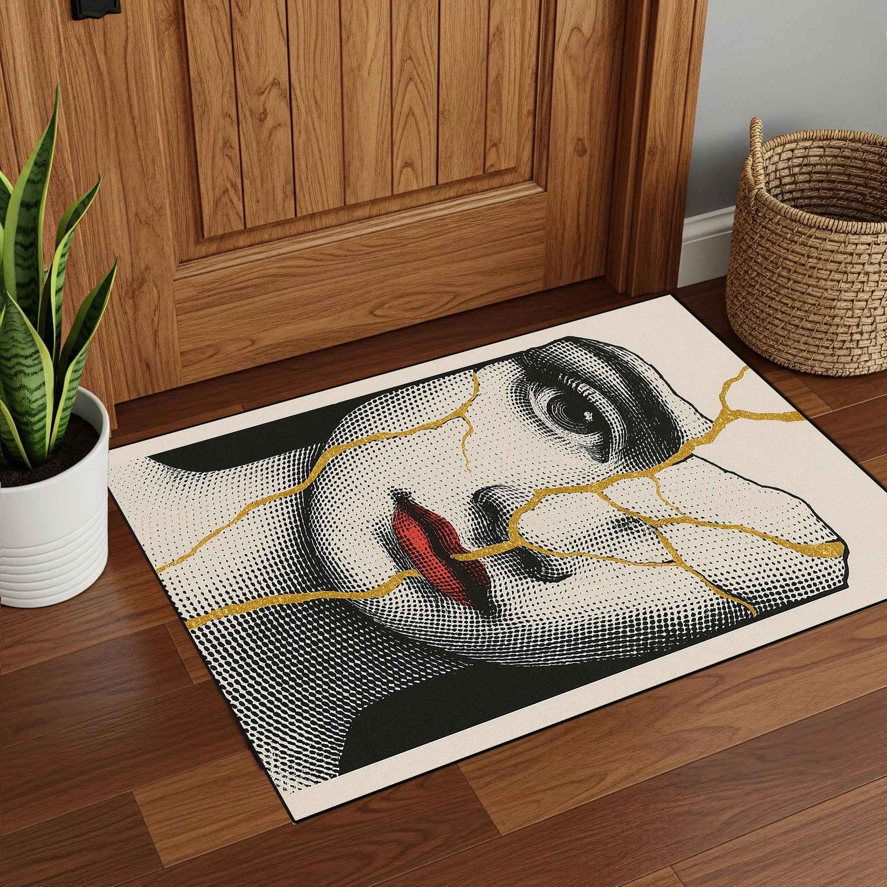 Sanatsal figürlü dikdörtgen halı; yüz figürü üzerinde ilerleyen altın tonlu çatlak detaylarıyla dikkat çeker. Porselen yüzey hissi veren desen yapısı, estetik ve kırılganlık temasını yansıtır. Çarpıcı, karakteristik ve dekoratif bir halı modelidir.
