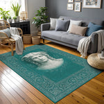 Merkez alanında antik heykel stilinde kadın yüzü illüstrasyonu yer alan turkuaz tonlu dekoratif halı; mermer heykel dokusunu andıran çizgisel detaylar, zarif bitkisel bordürler ve dengeli yüzey yerleşimiyle klasik sanat teması.