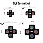 Geometrik ve modern grafik stilinde tasarlanmış dekoratif halı, artı formunda geniş bir kompozisyon içerir. Siyah zemin üzerinde dört dairesel alan bulunur ve her bölümde farklı renklerde oyun sembolleri yer alır. Turkuaz üçgen, kırmızı daire, pembe kare ve mavi çarpı figürleri minimal ve illüstratif grafik tasarım oluşturur.