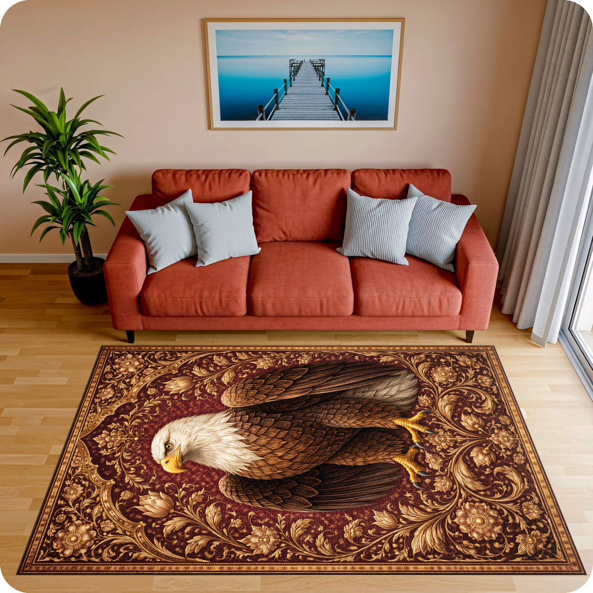 Sanatsal ve vintage dekoratif halı tasarımı, merkezde etkileyici kartal figürü içerir. Koyu kırmızı zemin üzerinde yer alan figür, etrafındaki altın tonlu ornamental ve floral desenlerle zengin kompozisyon oluşturur.